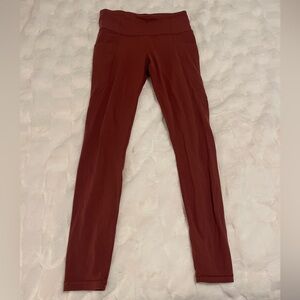 Gently worn Athleta leggings with pockets, size small